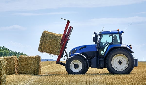 Quel est l'impact du chargeur frontal sur mes pneus agricoles ?